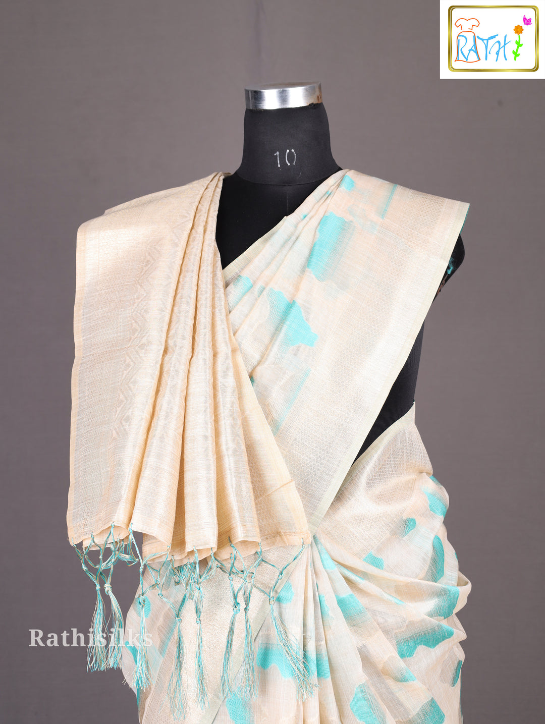 Elegant Cream and Aqua Synthetic Saree
