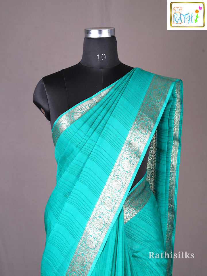Teal Green Semi Soft Silk Saree