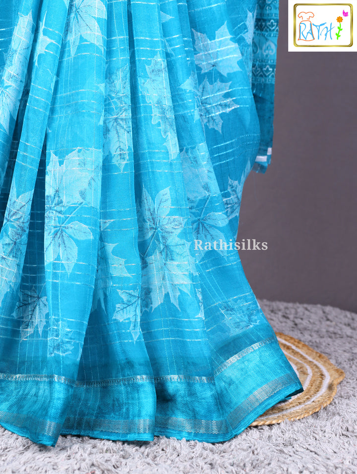 Elegant Turquoise Printed Saree