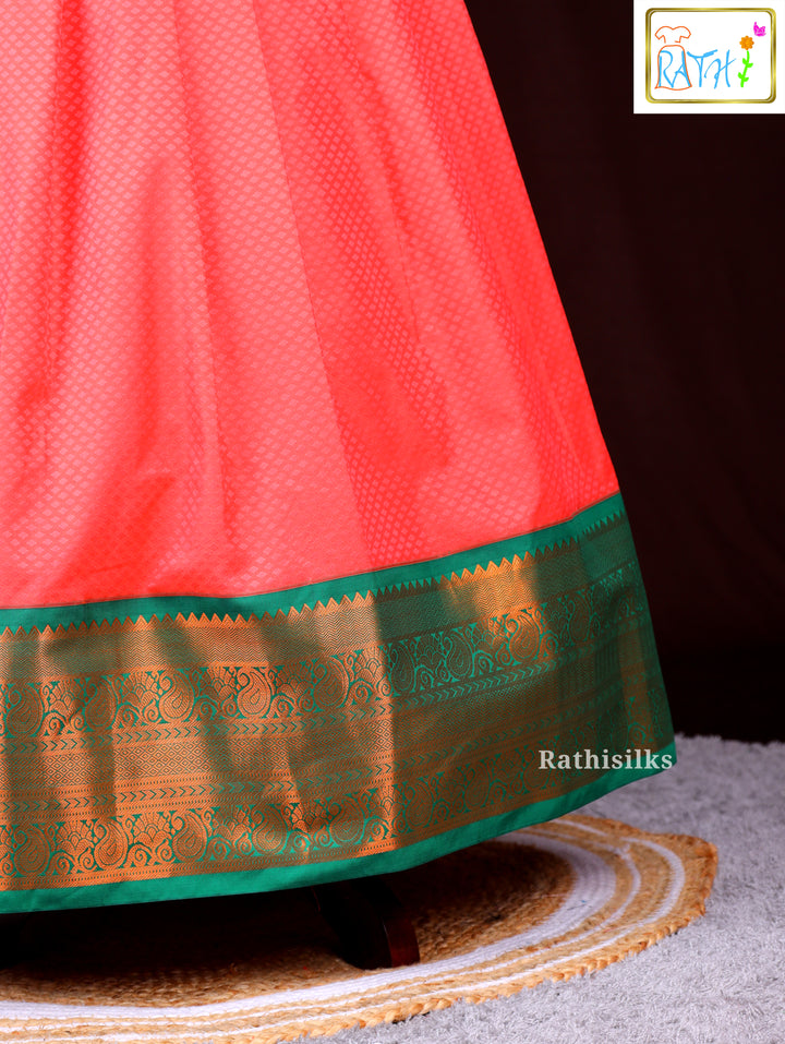 Green Blouse with Contrast Orange Pavadai