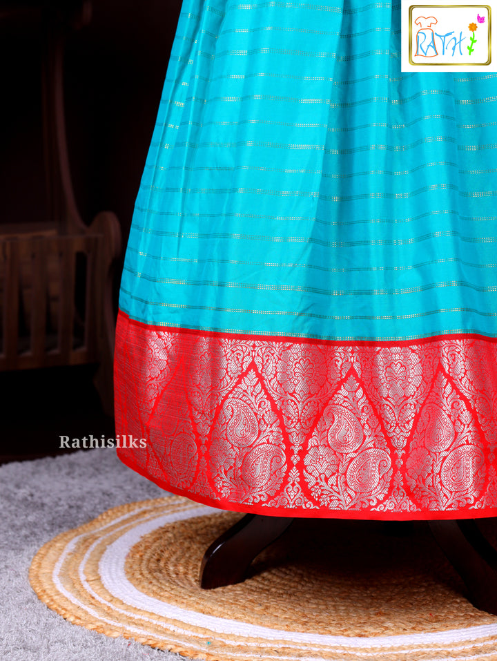 Red Blouse with Blue Zari Woven Pavadai