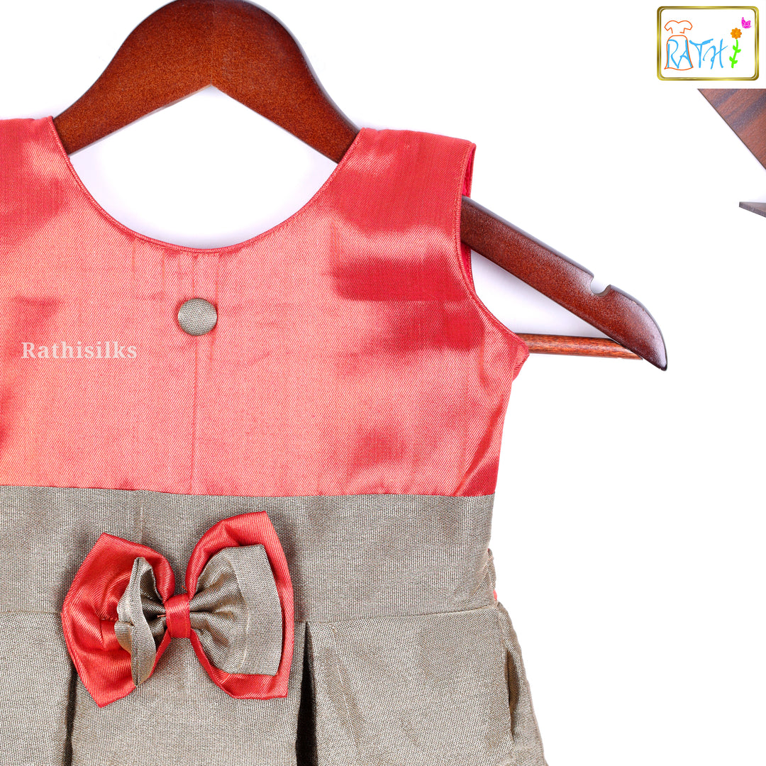 Elegant Gold & Red Frock with Bow Design