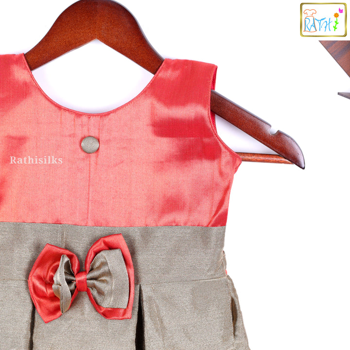 Elegant Gold & Red Frock with Bow Design