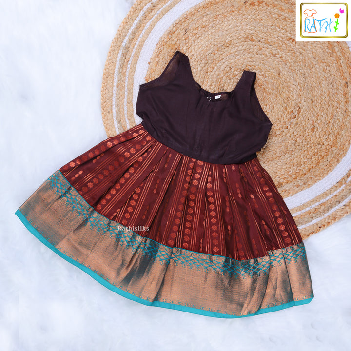Turquoise Blouse and Maroon Zari Pavadai