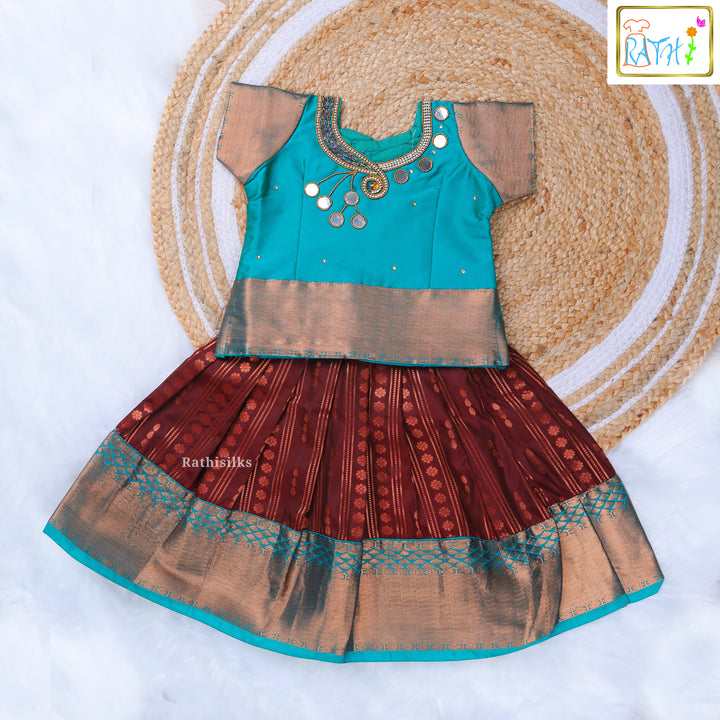 Turquoise Blouse and Maroon Zari Pavadai