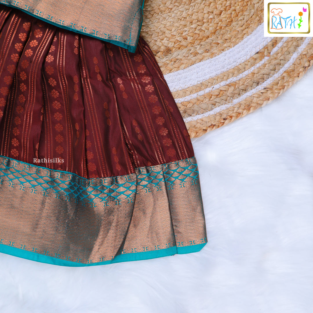 Turquoise Blouse and Maroon Zari Pavadai