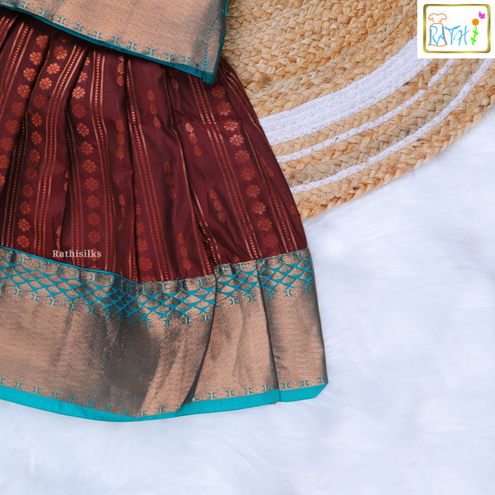 Turquoise Blouse and Maroon Zari Pavadai