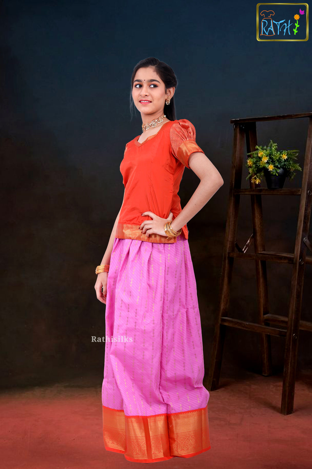 Bright Orange Blouse & Pink Zari Pavadai Set