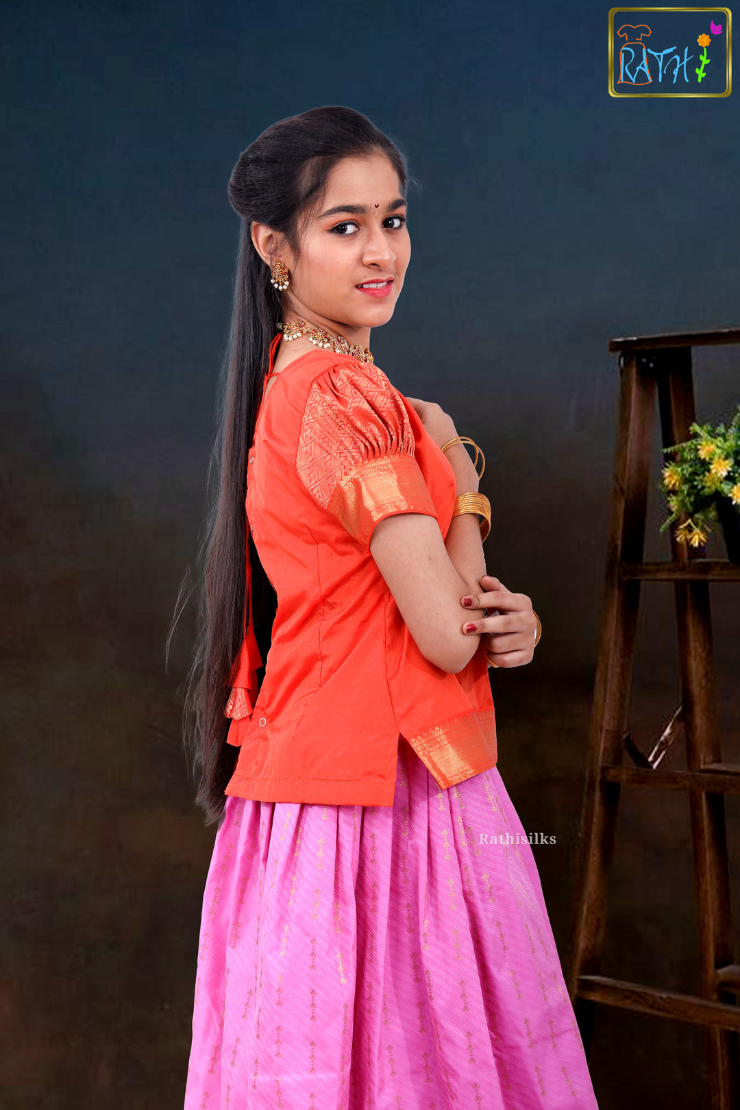 Bright Orange Blouse & Pink Zari Pavadai Set