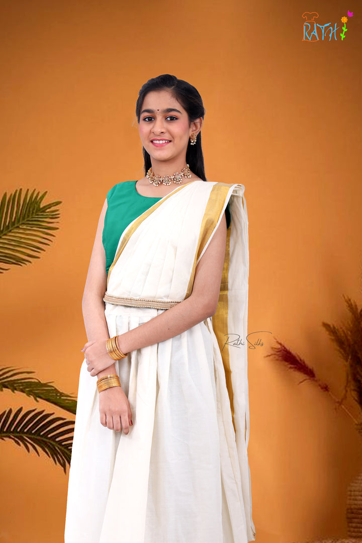 Elegant Kerala-Style White & Gold Saree Dress